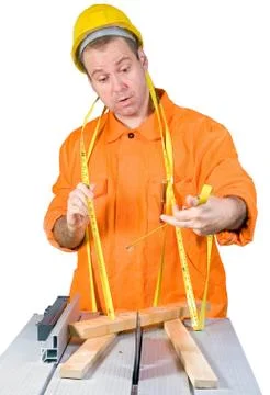 Carpenter working on an circular saw Stock Photos