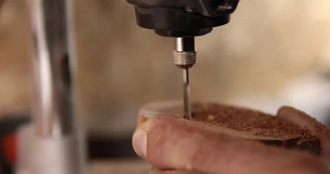 Carpenter working on the drill machine in his workshop Video stock 233579159