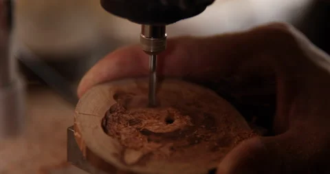 Carpenter working on the drill machine in his workshop Video stock 233582526