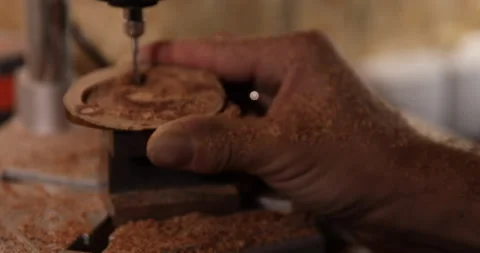 Carpenter working on the drill machine in his workshop Video stock 233583889