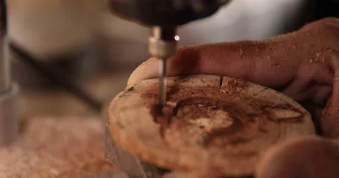 Carpenter working on the drill machine in his workshop Video stock 233585163