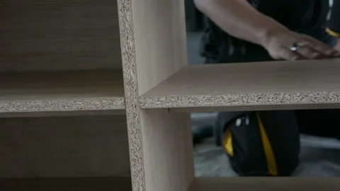 Carpenter working in his woodwork or furniture Stock Footage 96687183