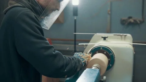 Carpenter working on a lathe. Stock Footage 237534034