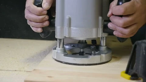 Carpenter working of manual milling machine in the carpentry workshop. slow Stock Footage 88471361