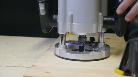 Carpenter working of manual milling machine in the carpentry workshop. slow Stock Footage 88472090