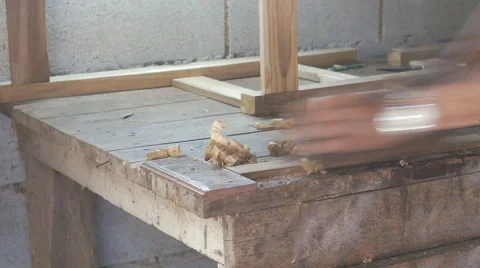 Carpenter working with planer Stock Footage 47632441