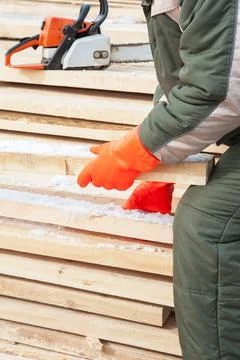 Carpenter working at sawmill Stock Photos