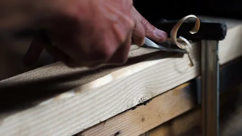Carpenter working with a sharp chisel Stock Footage 312274899