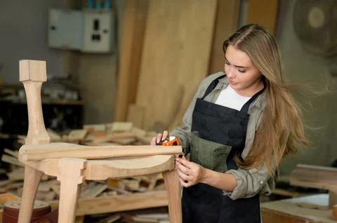 Carpenter working in the studio. Stock Photos