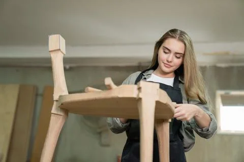 Carpenter working in the studio. Stock Photos