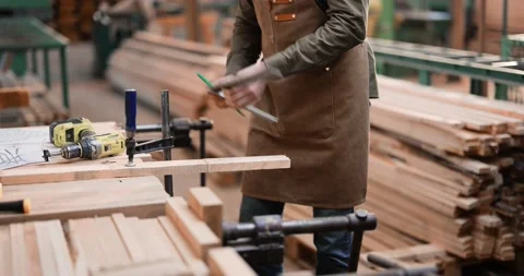 Carpenter working with wood Stock Footage 146919098