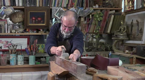 Carpenter working with a wood planer Video stock 58012535
