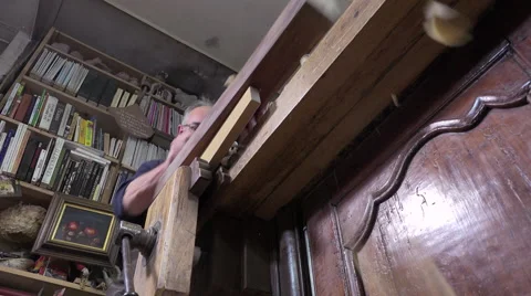 Carpenter working with a wood planer 스톡 동영상 58015148