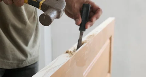 Carpenter working on wooden door frame interior building Stock-Footage 169742328