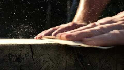 Carpenter working with wooden table and sandpaper in the yard Stock Footage 276760123