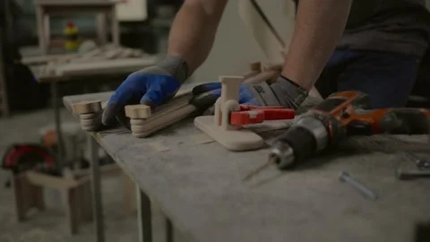 Carpenter working on woodworking machines in carpentry shop. Stock Footage 219346865