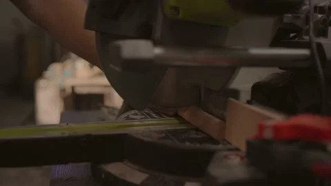 Carpenter working on woodworking machines in carpentry shop. Stock Footage 219347224