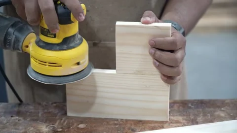 Carpenter working on woodworking machines in carpentry shop Stock Footage 236895908