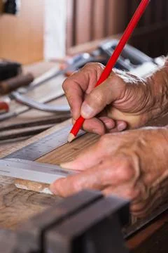 Carpenter working on the work bench, joinery tools and woodwork Stock Photos