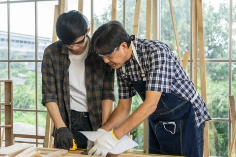Carpenter working in workplace 스톡 사진