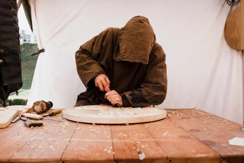 Carpenter working in the workshop. Man at work on wood Stock Photos