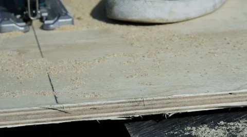 Carpenter works electric fretsawclose-up Stock Footage 59369820