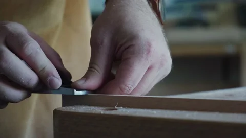 The carpenter works with a jack-plane Stock Footage 156510818