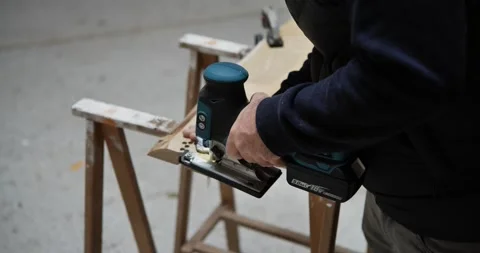 A carpenter works on a ladder Stock Footage 327811051