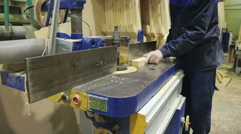 Carpenter works for the machine Stock Footage 61919929