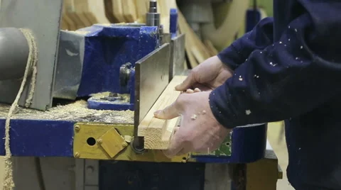 Carpenter works for the machine Stock Footage 61924278