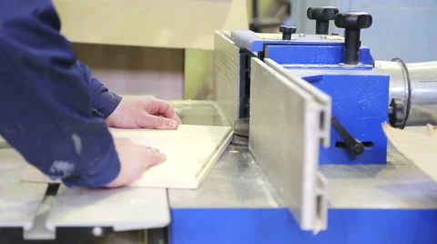 Carpenter works for the machine Stock Footage 61926140