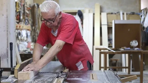 Carpenter works in a workshop Stock Footage 76895231