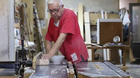 Carpenter works in a workshop Stock Footage 77268259
