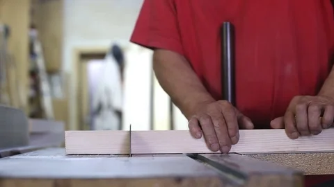 Carpenter works in a workshop Stock Footage 78789001