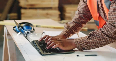 Carpenter, workshop and hands of man on laptop for furniture order, project Stock Footage 341304647
