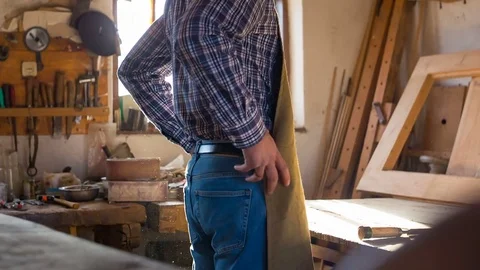 Carpenter in workshop. Preparing for work Stock Footage 84413116
