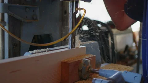 Carpenter in the workshop, works with wood, makes furniture parts in natural Stock Footage 201811483