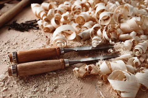 Carpenter's chisel, woodwork tool on the desktop in the workshop Stock Photos
