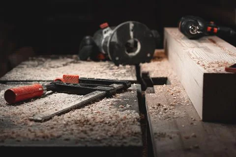 Carpenter's hand tool on the table on the background of wood shavings Stock Photos