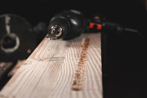 Carpenter's hand tool on the table on the background of wood shavings Stock Photos