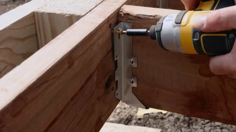 Carpentry and construction process assembling structural frame, installation in Stock Footage 332185475