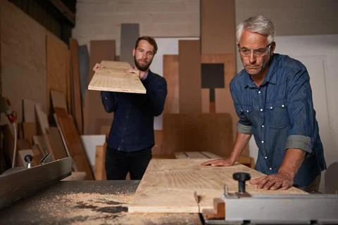 Carpentry, carpenter and men in workshop work on design project with team Stock Photos