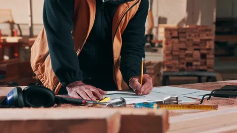 Carpentry, checklist or hands in workshop with paper, stock check or process Stock Footage 337993768