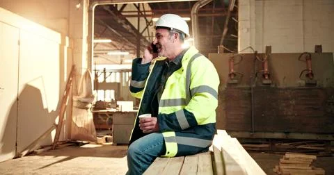 Carpentry, coffee and man in workshop for phone call, production update and Stock Photos
