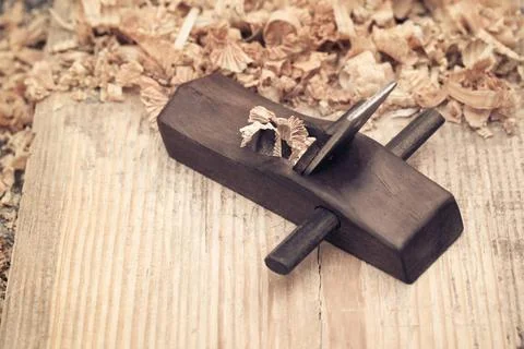 Carpentry concept background carpentry concept of wood planer and shavings... Photos