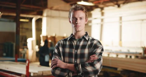 Carpentry, crossed arms and face of man in workshop for woodworking, furniture Stock Footage 341305720