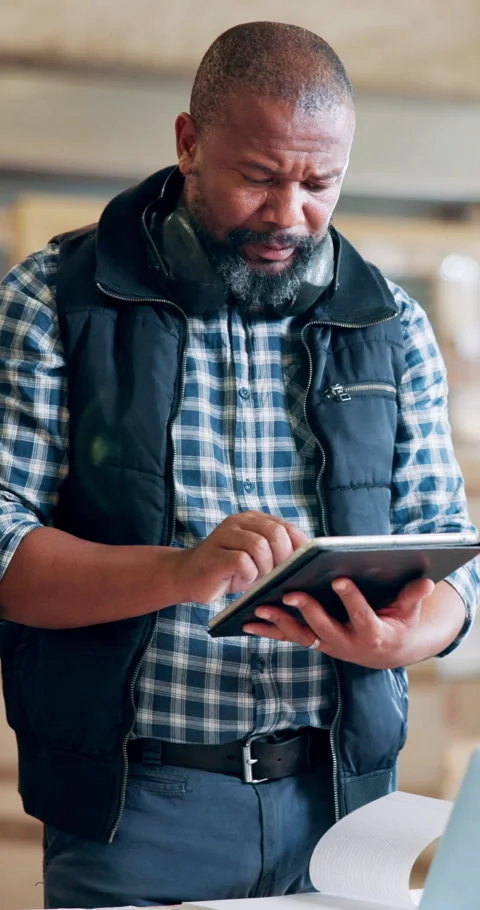 Carpentry, documents and tablet with black man in workshop for manufacturing or Stock Footage 331624296