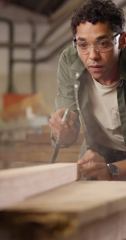 Carpentry, dust and man with air compressor for woodworking, furniture project Vídeo Stock 340968575