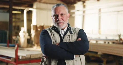 Carpentry, face and mature man in workshop for woodworking, furniture and timber Stock Footage 341306912