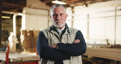 Carpentry, face and mature man in warehouse for woodworking, timber business and Stock Footage 341395761